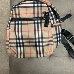 Dupe  back pack purse.